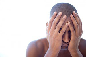 Woman showing signs of fatigue and stress